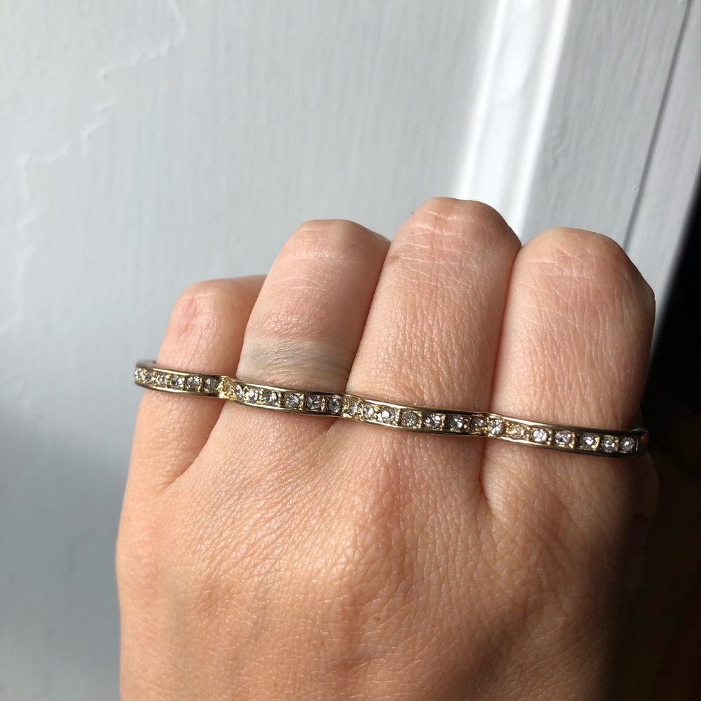 “Brass Knuckles” gold and diamond ring